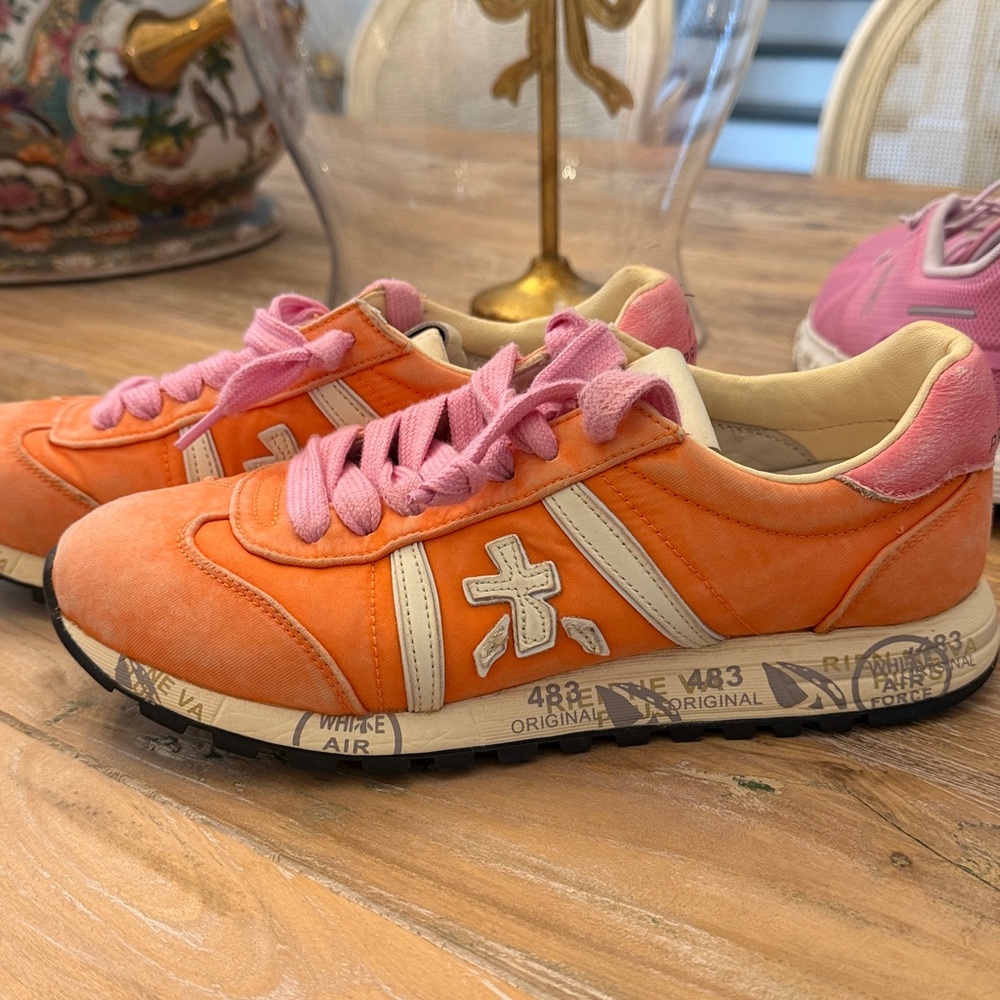 Premiata Lucy Sneakers In Orange with pink laces